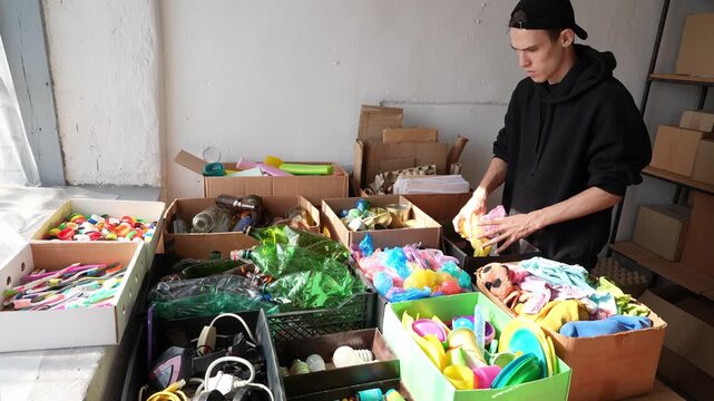 Separation of waste into fractions: plastic, glass, paper, metal, organic.