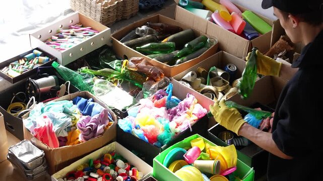 Sorting household waste. Separation of waste into fractions: plastic, glass, paper, metal, organic
