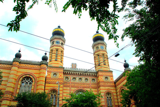 BUDAPEST, HUNGARY - AUGUST 30, 2025: Dohany Street Synagogue. The largest synagogue in Europe and third in the world, designed in the Moorish Revival style, featuring two prominent towers with domes