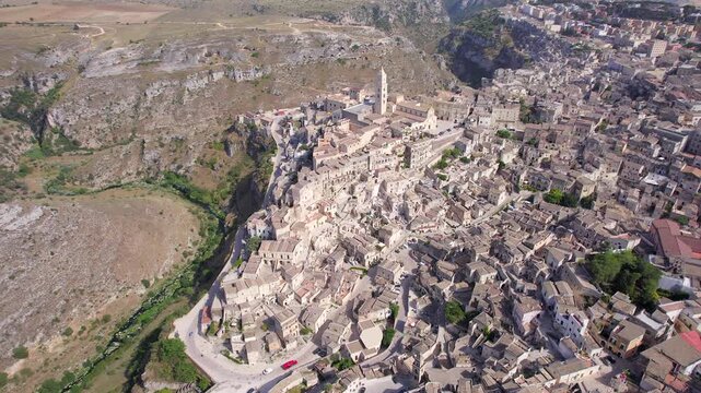 Aerial view of Matera Italy showing ancient stone architecture and Sassi di Matera district from high angle perspective.
