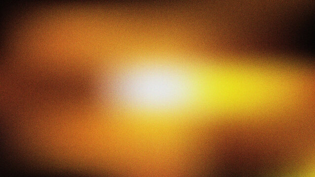 Warm artistic blurred orange yellow brown gradient background with bright light glow and grainy texture effect for creative projects