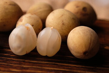 The duku, or Lansium domesticum often misidentified as  Lansium parasiticum is a type of fruit belonging to the Meliaceae family. © Ika