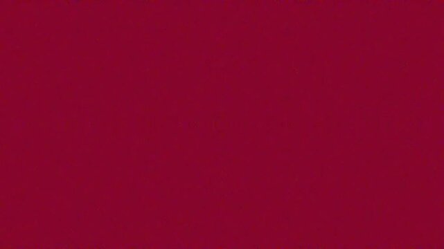Solid deep red textured background with subtle variations
