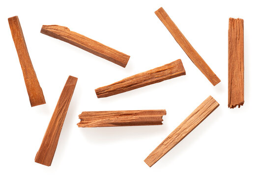 Red sandalwood sticks isolated on white background, top view.