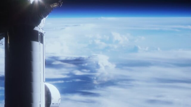 A spacecraft hovers in low Earth orbit. Below, a clear view of the planet shows clouds and the blue atmosphere. This view captures the beauty of our planet from a distance.