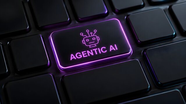Agentic artificial intelligence concept on glowing purple keyboard button showing robot integration advanced cyber technology and digital innovation