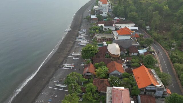 Quiet Amed Beach And Village East Bali Indonesia Drone Track Overhead 4K 60FPS