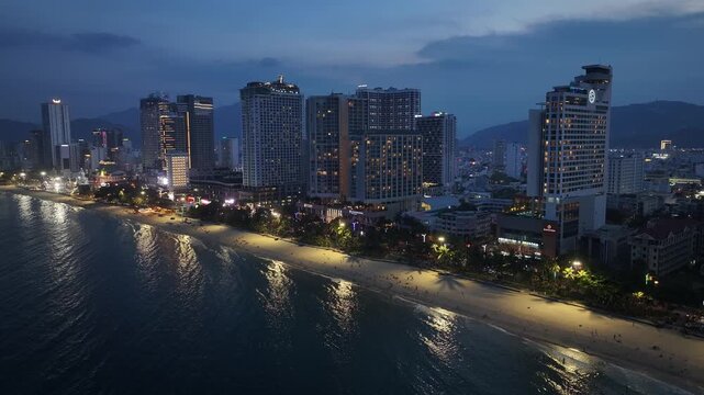 Aerial view of Nha Trang city skyline, beach scenery, and night view in Vietnam