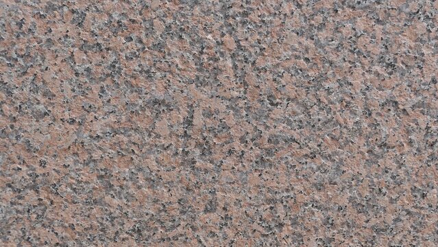 Pink and Gray Natural Stone Surface with Speckled Texture