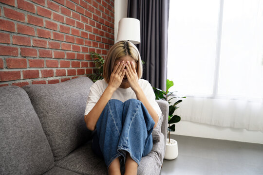The depression Young Asian woman think something at home