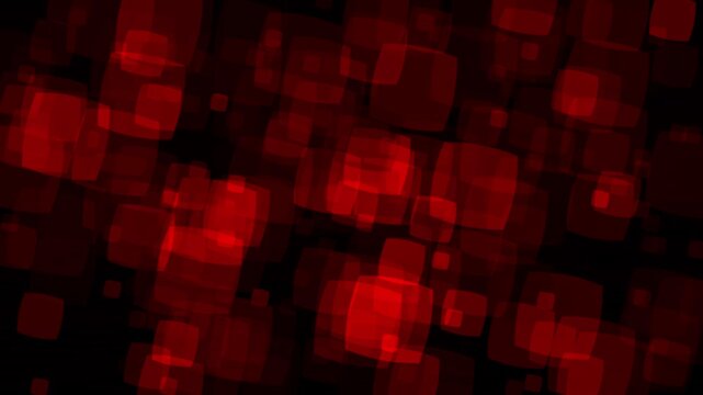 Abstract red glowing bokeh cubes floating across black background in loop motion footage.