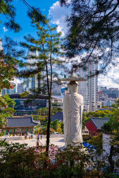 Maitreya Buddha and Bongeunsa Temple with Modern Seoul Skyline in Gangnam, Historic Buddhist Landmark and Popular Tourist Attraction in Seoul, South Korea