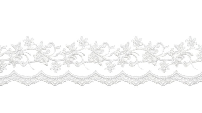 White floral lace trim with intricate embroidery sits horizontally on a black background. Lace trim serves as a decorative border for wedding invitation design and vintage sewing craft projects.
