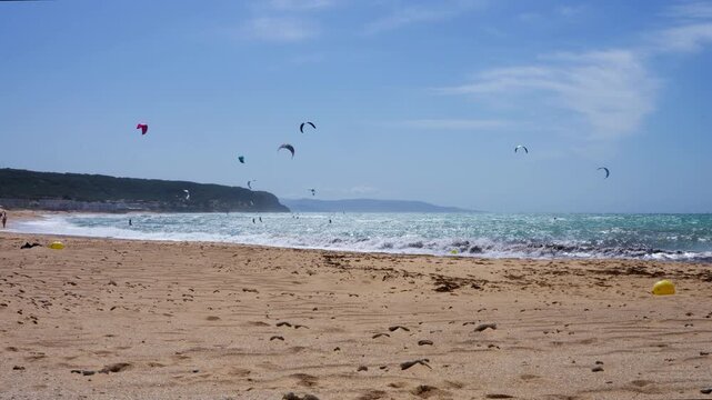 Kite surfers in Trafalgar beach, Cadiz, Spain