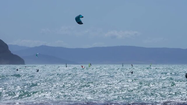 Kite surfers in Trafalgar beach, Cadiz, Spain