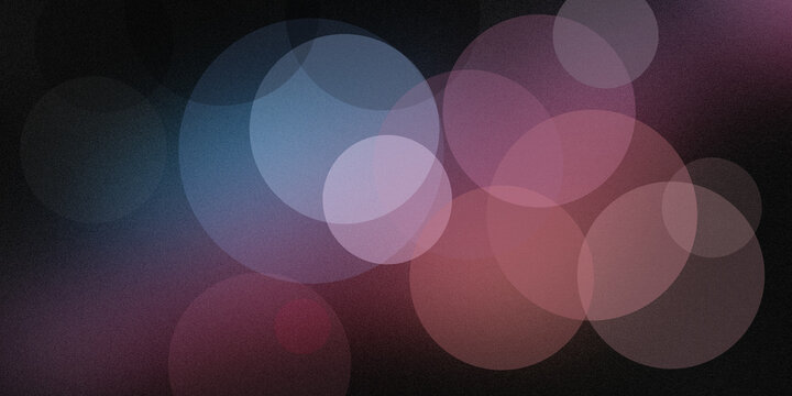 Abstract bokeh background with overlapping circles in blue pink and purple hues for digital design backgrounds.