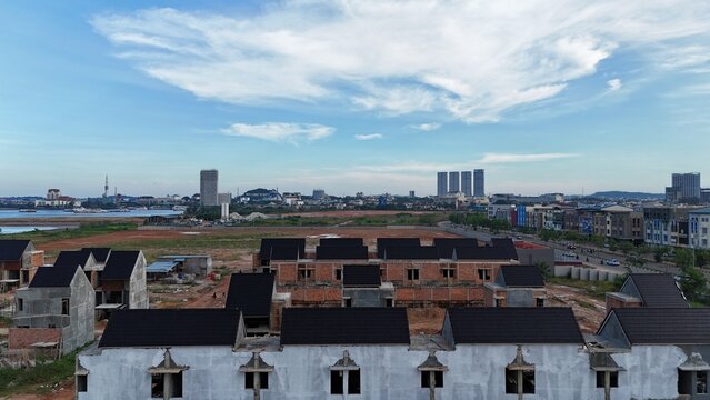 Cityscape View of Construction in Urban Area on Sunny Day