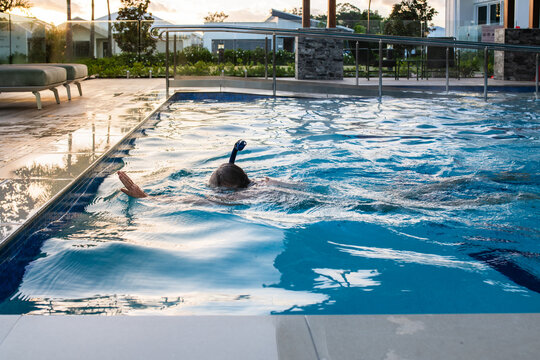 senior woman doing morning laps