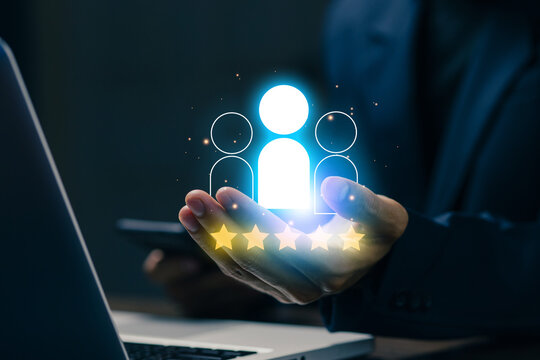 Business professional holding customer rating icon with five stars, representing customer experience, feedback, satisfaction, reputation, service quality, trust, and performance review.