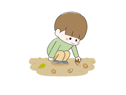 どんぐりを拾うこども