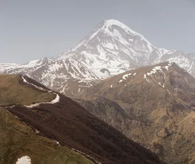 Majestic Mount Kazbek Peak in Caucasus Mountains Georgia © Elena