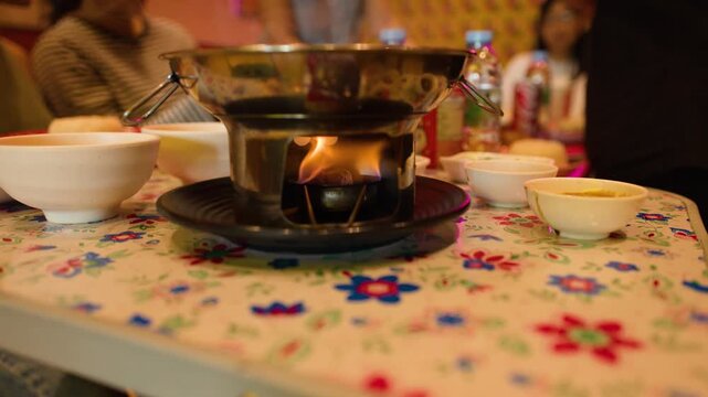 Traditional Thai Steamboat Hot Pot with Burning Fire Stove