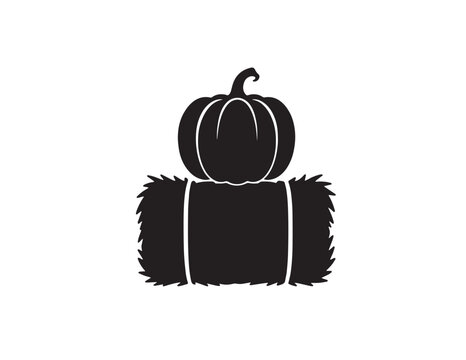Pumpkin sitting on a bale of hay silhouette for seasonal autumn and Halloween graphic design