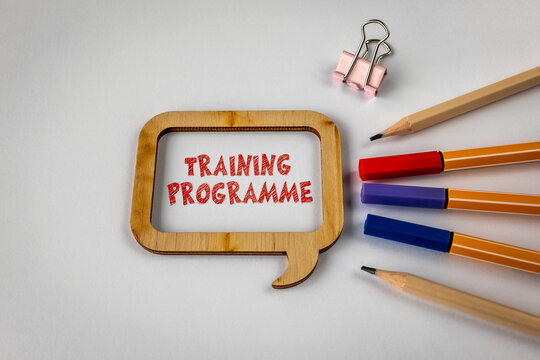 TRAINING PROGRAMME Message Framed by Pencils and Colorful Markers