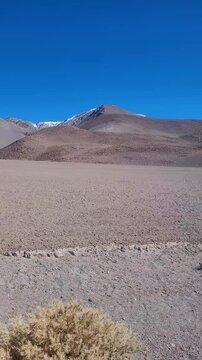 View of the puna in the Andes Mountains. Hills and mountains of the Andean mountain range