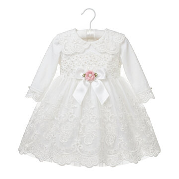 Elegant white baby girl christening dress with lace embroidery, pearls, and pink flower bow isolated on transparent background