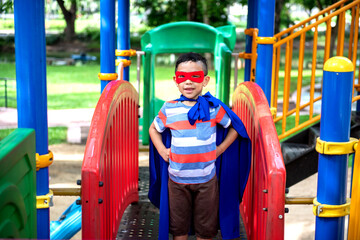Child superhero on playground adventure. © Rawpixel.com