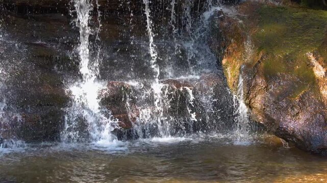 Cascading Waterfall Over Mossy Rocks in Wentworth Falls Australia