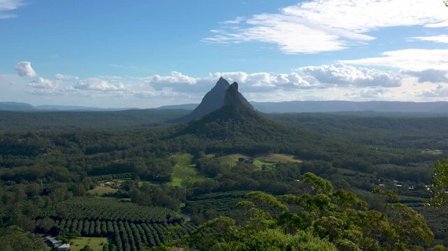 View of Mt. Coonowrin and Mt. Beerwah from Mt. Ngungun on a sunny day at Glass House Mountains Sunshine Coast, Queensland, Australia.