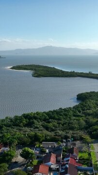 Florian&oacute;polis, Daniela Beach. Aerial View of Tropical Coastline. Establishing Shot. Santa Catarina, Brazil.