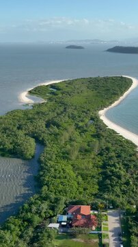 Florian&oacute;polis, Daniela Beach. Aerial View of Tropical Coastline. Establishing Shot. Santa Catarina, Brazil.