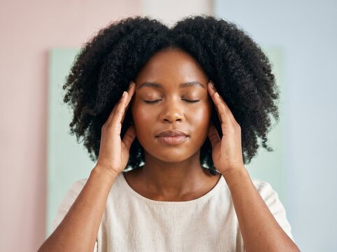 Stressed Young African American Woman Massaging Temples to Relieve Migraine or Headache