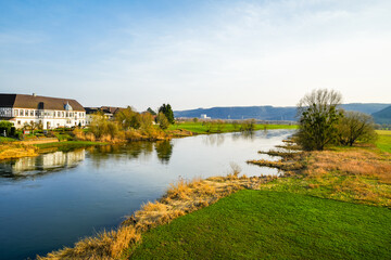 Fototapeta premium View of the Weser and the surrounding landscape from the Weser bridge near Beverungen. 