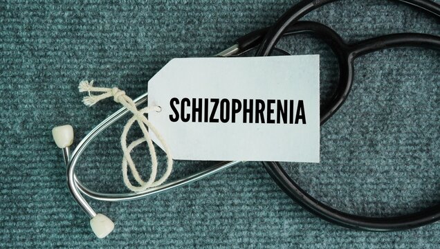 Stethoscope and paper tag with the words Schizophrenia is a severe, chronic mental health disorder that affects how a person thinks, feels, and behaves, often making it difficult to distinguish betwee
