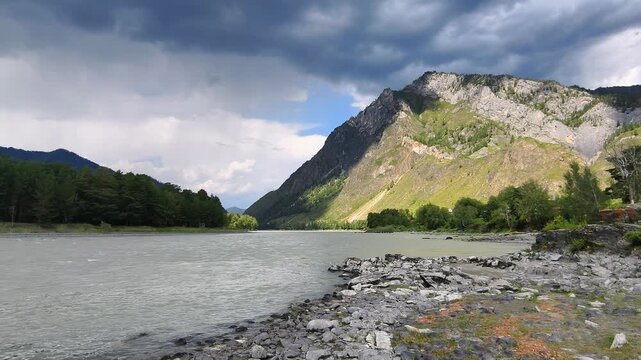 Slow motion video of Altai river Katun. Natural mountain landscape in Summer season.