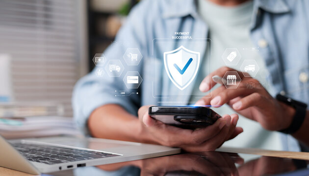 Secure mobile payment concept showing a successful digital transaction, smartphone and laptop with shield protection, online shopping, fintech,