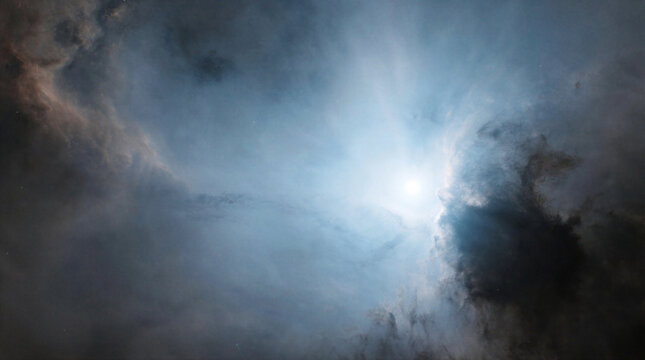 Stellar illumination casting soft blue halos from dust particles surrounding a young blue supergiant star in dark space