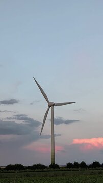 wind turbine in sunset sky