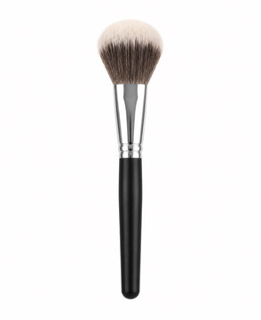 Makeup brush with dense bristles on white background