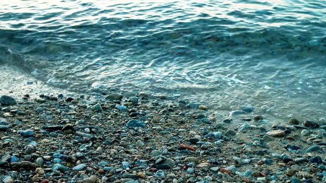 Movement of Mediterranean Sea water reaching shore. The video was shot at Villa San Giovanni, in Calabria, on the shore of the Strait of Messina