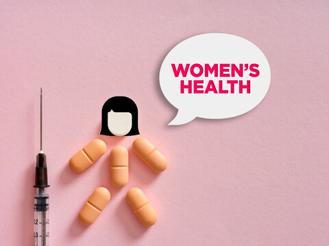 Women's health symbol with pills and syringe