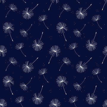 Seamless paper pattern with white dandelion flowers on a dark blue background