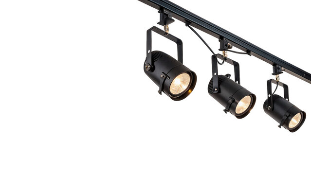 Modern black track lighting system with three spot lamps isolated on transparent background for interior design studio.