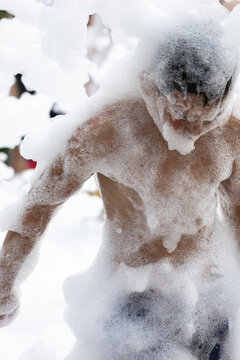 Man covered in thick white foam