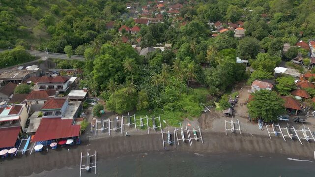 Mountains Jungle And Ocean Jemeluk Bay Amed Bali Indonesia Drone Track In Pan Up 4K 60FPS