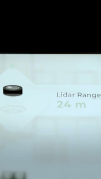 Black LiDAR puck accompanies 24 meter reading